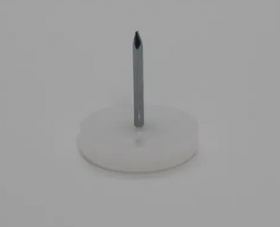 A single white plastic base glide with a metal nail protruding from the center