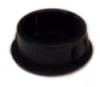 Black plastic round insert for a 1" hole, typically used as a locking plug for cabinets and furniture.
