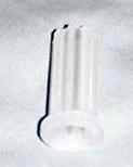 A white plastic socket designed to fit into round or square tubing for a 7/16 inch grip ring stem